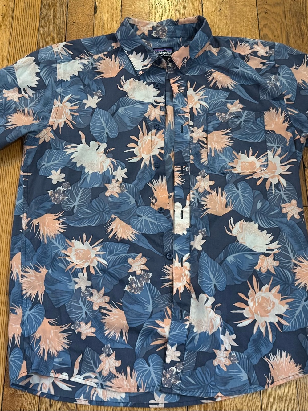 Patagonia Navy Blue Floral Short Sleeve Button-Up with Peach Accents